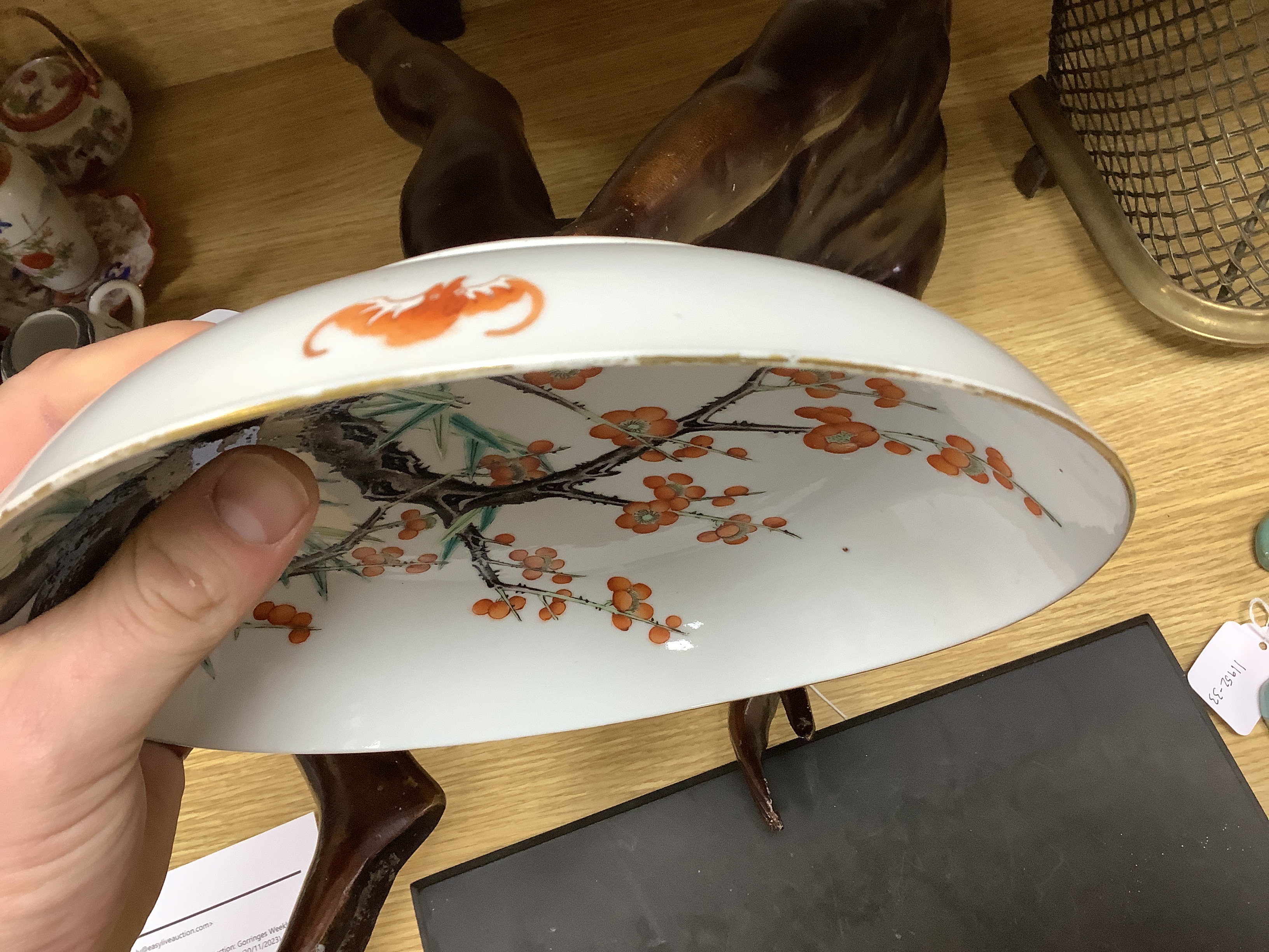 A Chinese enamelled porcelain ‘prunus’ saucer dish, Guangxu six character mark and of the period (1875-1908), 21cm diameter